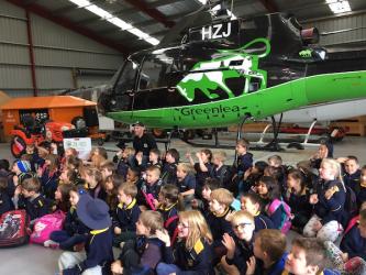 Here are Rooms 9 13 and 14 in front of the rescue helicopter