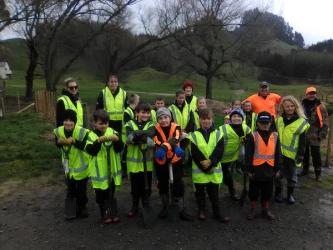Students ready to plant with parents and Mr Bolton