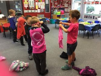 Putting on our pink shirts 